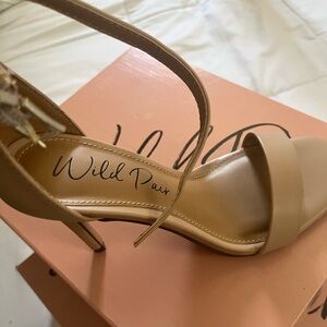 Nude heels brand new in box.